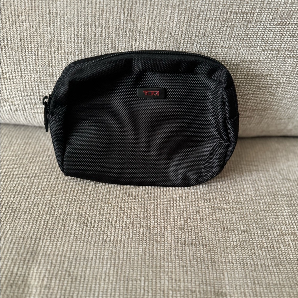 Tumi Black Toiletry Bag with Zipper Closure